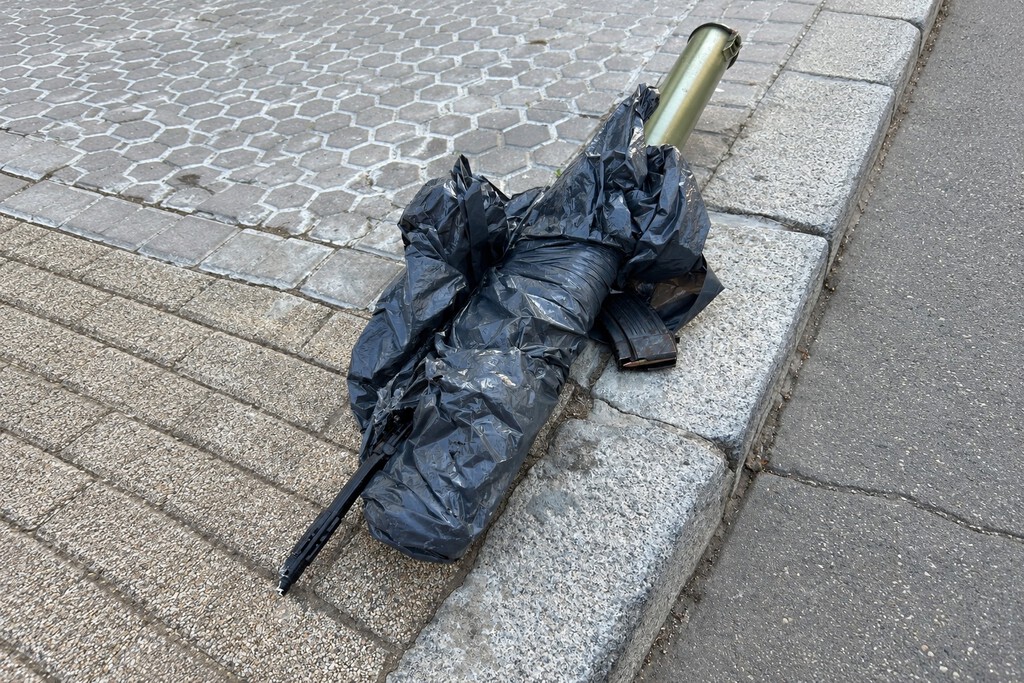 Assault Rifle Found in Trash Sparks Police Investigation in Seville